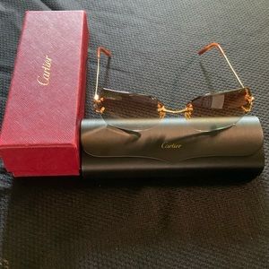 Authentic Cartier Glasses with original boxes.
